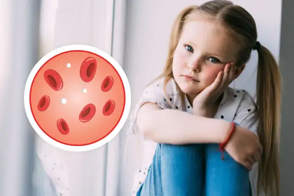 Smutna dziewczynka z niskimi leukocytami. Obok niej okrąg z czerwonymi krwinkami i kilkoma białymi, symbolizującymi niskie leukocyty.